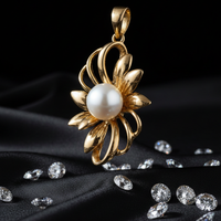 Yellow gold freshwater pearl sunburst pendant - three-quarter angle