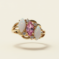 14K yellow gold pink CZ and opal marquise ring floating on ivory backdrop luxury editorial marketing image