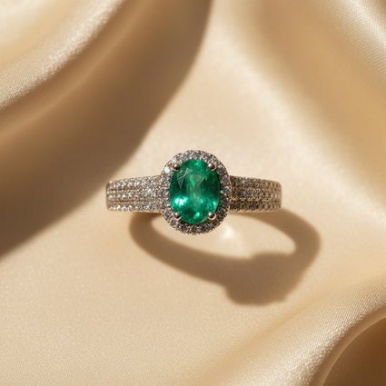 18K White Gold Oval Emerald & Diamond Halo Ring - editorial top down
