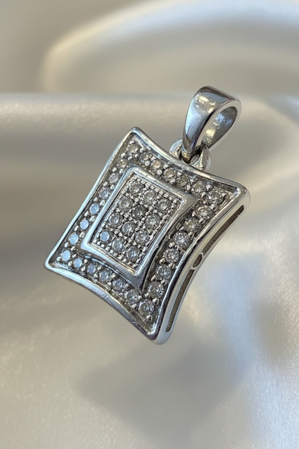 14K white gold diamond cushion shield pendant three-quarter view