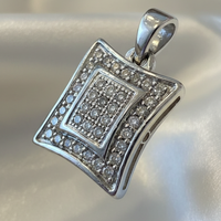 14K white gold diamond cushion shield pendant three-quarter view