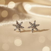 10K white gold natural diamond flower cluster stud earrings with marquise and baguette diamond petals, angle 4