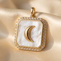 18K yellow gold white mother-of-pearl and diamond crescent moon pendant, turned view