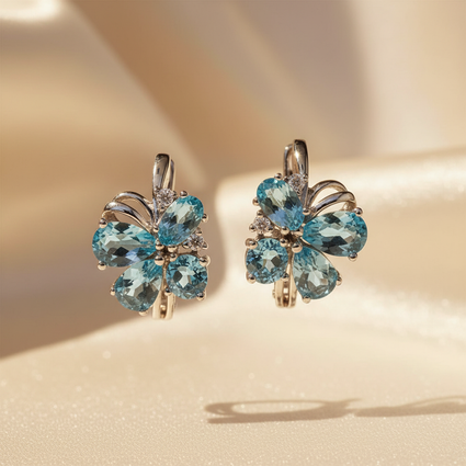 14K White Gold Blue Topaz Butterfly Earrings - Angle View