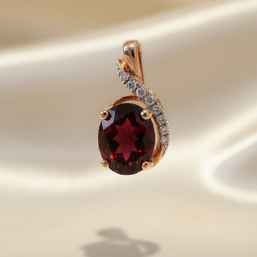 14K rose gold oval garnet and diamond pendant front view