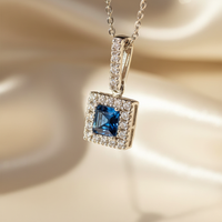 14K White Gold Blue Sapphire Square Halo Pendant - Editorial Angle