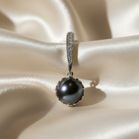 14K White Gold Black Pearl White Topaz Pendant - crown detail macro editorial