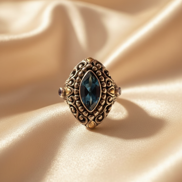 Sterling Silver 18K Yellow Gold Blue Topaz and Iolite Ring - editorial top view
