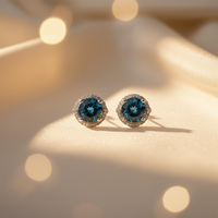10K white gold London blue topaz and diamond halo stud earrings - editorial marketing image 3