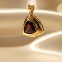 14K yellow gold trillion garnet slide pendant three-quarter view