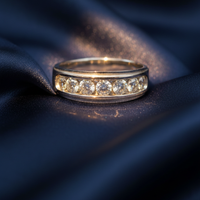 10K White Gold Men's Five-Stone Diamond Band Ring on midnight blue silk backdrop editorial marketing image