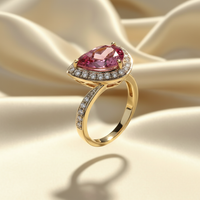 14K Yellow Gold Diagonal Pear-Cut Pink Tourmaline Ring with Diamond Halo - Three-Quarter View
