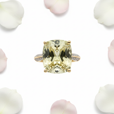 Lime quartz ring top down view with white and pink rose petals