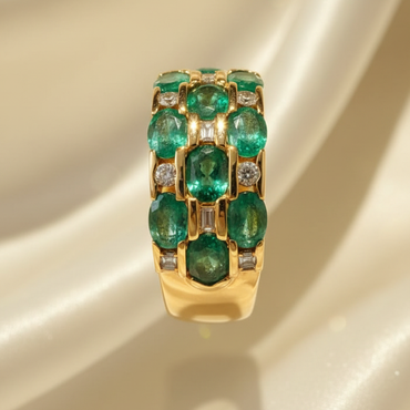 14K yellow gold three-row oval emerald and .16ctw diamond wide band ring, front view