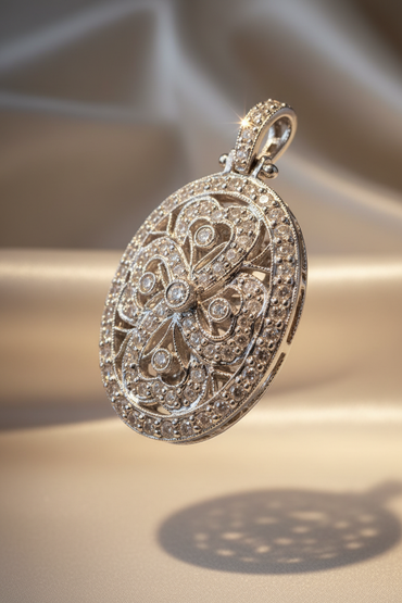 18K white gold .56ctw diamond art deco oval filigree locket, elevated three-quarter view