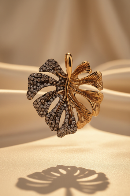 14K yellow gold .60ctw champagne diamond two-tone monstera leaf pendant with chain, front view
