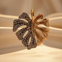 14K yellow gold .60ctw champagne diamond two-tone monstera leaf pendant with chain, front view