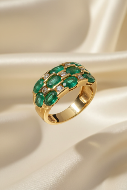 14K yellow gold three-row oval emerald and .16ctw diamond wide band ring, top-down view