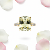 Lime quartz ring front facing view with white and pink rose petals