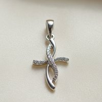 10K White Gold 1/20ctw Diamond Ribbon Twist Cross Pendant - angle 3