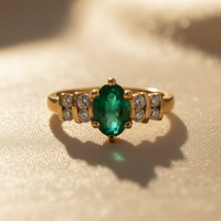 14K Yellow Gold Oval Emerald & Diamond Ring - editorial close up