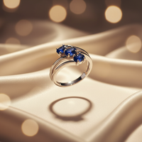 14K White Gold Three-Stone Oval Blue Sapphire Ring - Side View