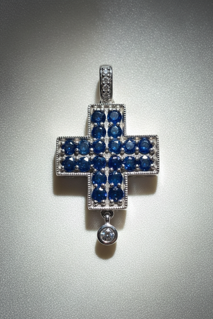 14K white gold blue sapphire and diamond cross pendant, front view