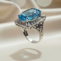 10K white gold oval blue topaz and diamond ring three-quarter side view