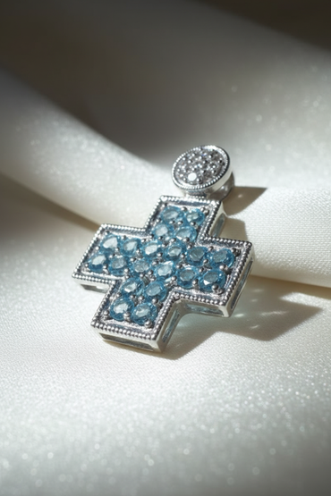 14K white gold blue topaz and diamond square cross pendant, three-quarter angle