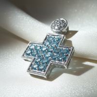 14K white gold blue topaz and diamond square cross pendant, three-quarter angle