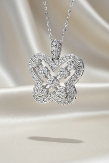14K white gold 1/2ctw diamond Art Deco quatrefoil pendant - editorial marketing image