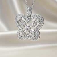 14K white gold 1/2ctw diamond Art Deco quatrefoil pendant - editorial marketing image