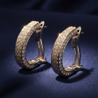 18K White Gold Triple Row Pavé Diamond Hoop Lever-Back Earrings on midnight blue silk backdrop editorial marketing image