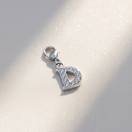 Sterling Silver CZ Letter D Charm - Light Background