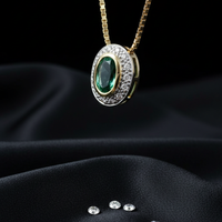 14K Yellow Gold Oval Emerald Diamond Halo Pendant Necklace - Three-Quarter Angle