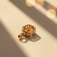 10K yellow gold orange citrine and diamond halo pendant showing ornate filigree basket back detail