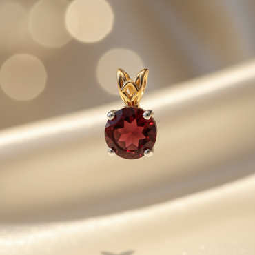 14K two-tone gold round garnet pendant bail detail