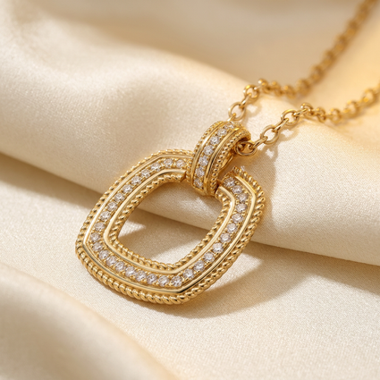 DOV 18K yellow gold diamond open cushion pendant, angled view on cream satin