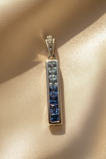 14K White Gold Blue Sapphire Bar Pendant - Gradient Marketing Image