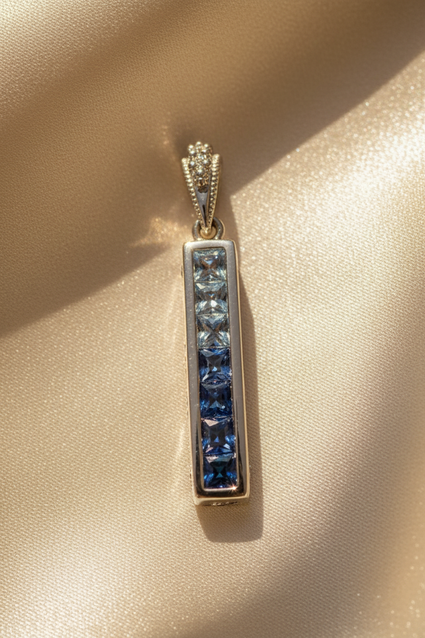 14K White Gold Blue Sapphire Bar Pendant - Gradient Marketing Image