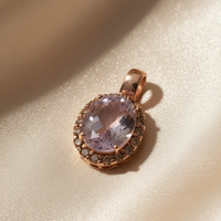 14K rose gold amethyst and smoky quartz halo pendant, top-down angle