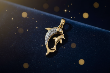1/12 CTW Diamond Double Dolphin Pendant in 10K Yellow Gold
