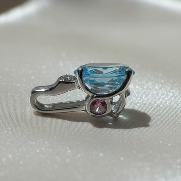 14K white gold oval blue topaz and pink tourmaline pendant, side profile