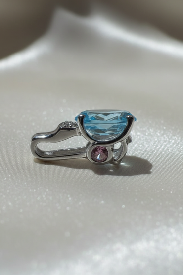 14K white gold oval blue topaz and pink tourmaline pendant, side profile
