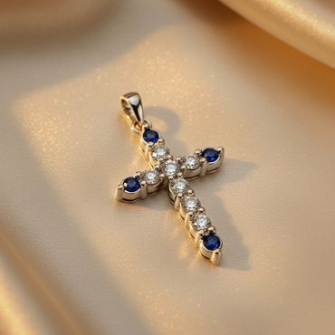 10K white gold cross pendant with alternating round brilliant diamonds and blue sapphires, angle 2