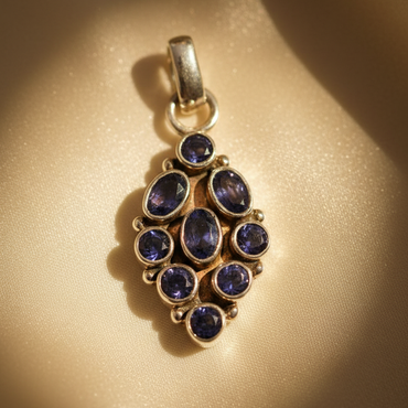 Sterling silver iolite 9-stone cluster pendant - editorial marketing image 1