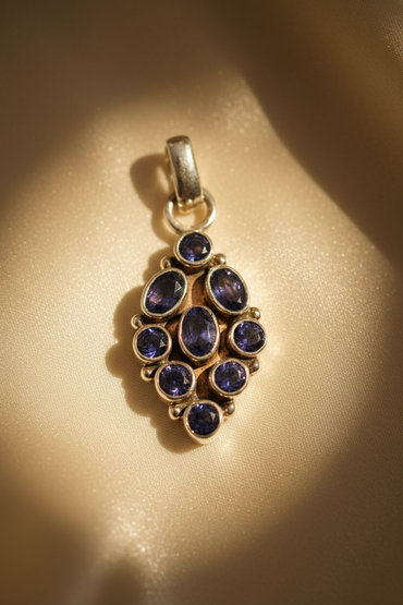 Sterling silver iolite 9-stone cluster pendant - editorial marketing image 1