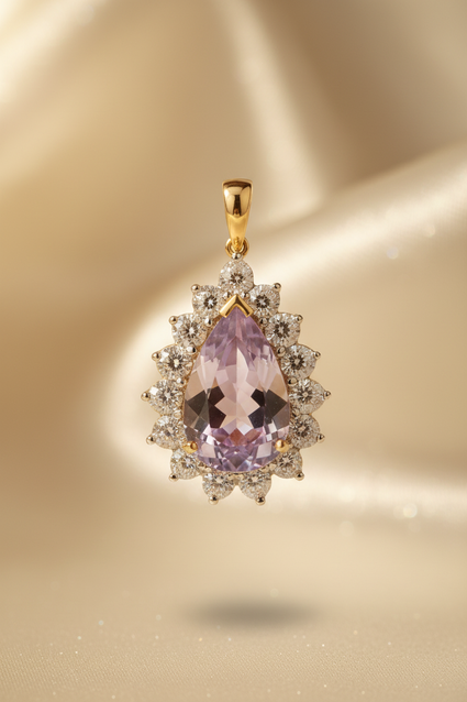 10K yellow gold pear-cut amethyst and diamond starburst halo pendant, front view