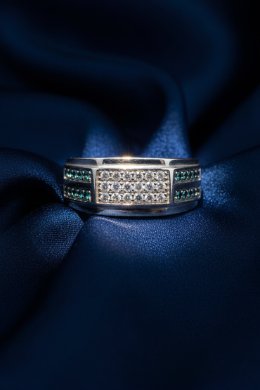 10K White Gold Men's White and Teal Diamond Wide Band Ring on midnight blue silk backdrop editorial marketing image