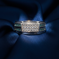 10K White Gold Men's White and Teal Diamond Wide Band Ring on midnight blue silk backdrop editorial marketing image